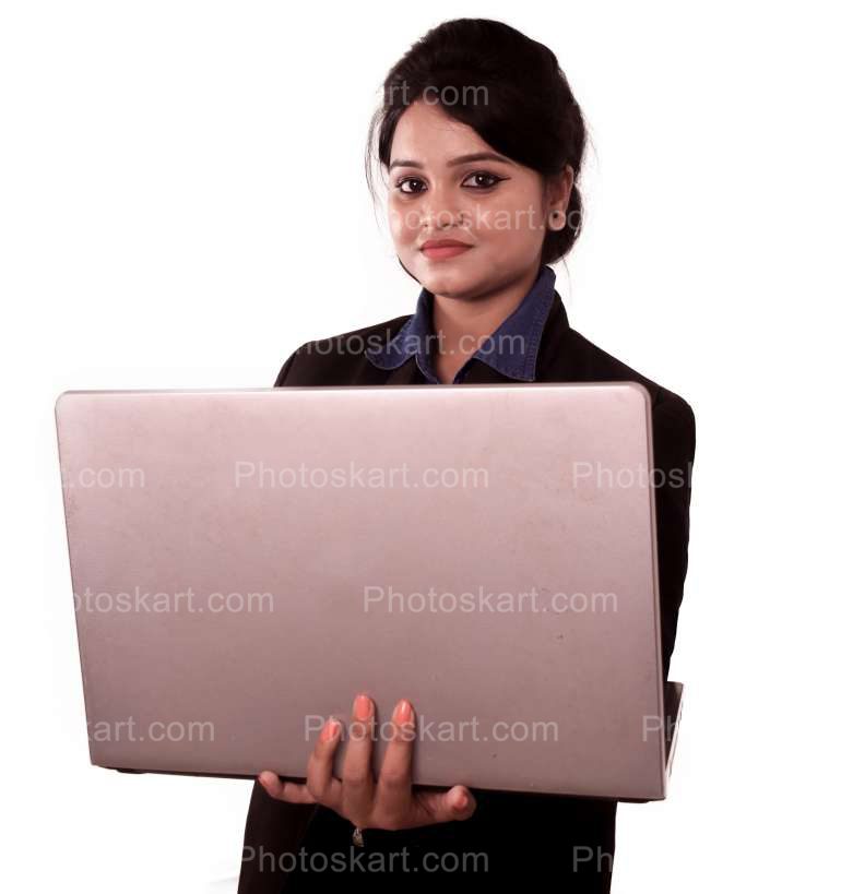 An Standing Indian Corporate Girl Working On Laptop Stock Photos