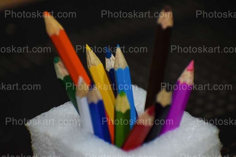 Color Pencils In A Container With Black Background Stock Image