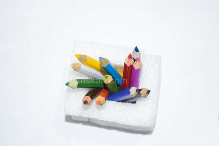 Color Pencils In A Sponge Cup Stock Photo