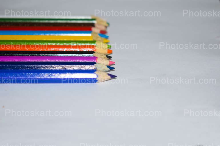 Colored Pencils In A White Background Stock Photo