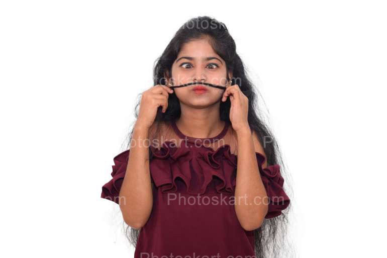 funny girl making mustache with her hair stock photos | Photoskart