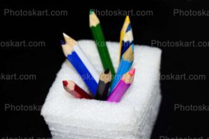 multicolor color pencils in a pencils bucket stock image