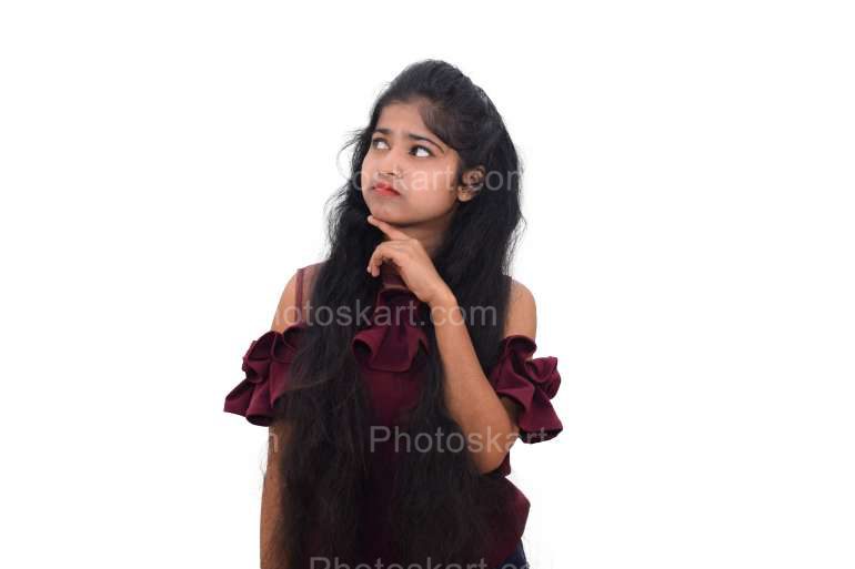 Portrait Of A Cute Girl Thinking Isolated On White Background