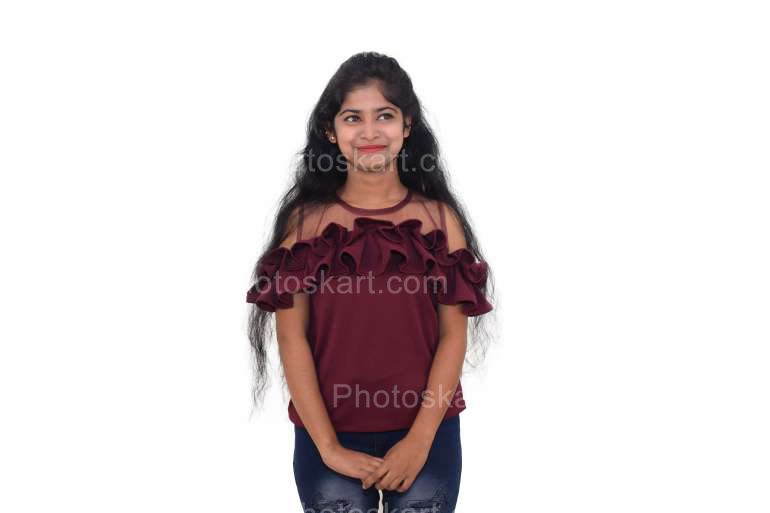 Portrait Of A Smiling Indian Young Beautiful Girl Standing