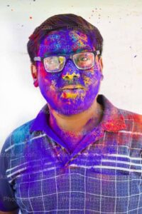 portrait-of-a-young-indian-boy-enjoying-indian-holi-festival-stock-photo
