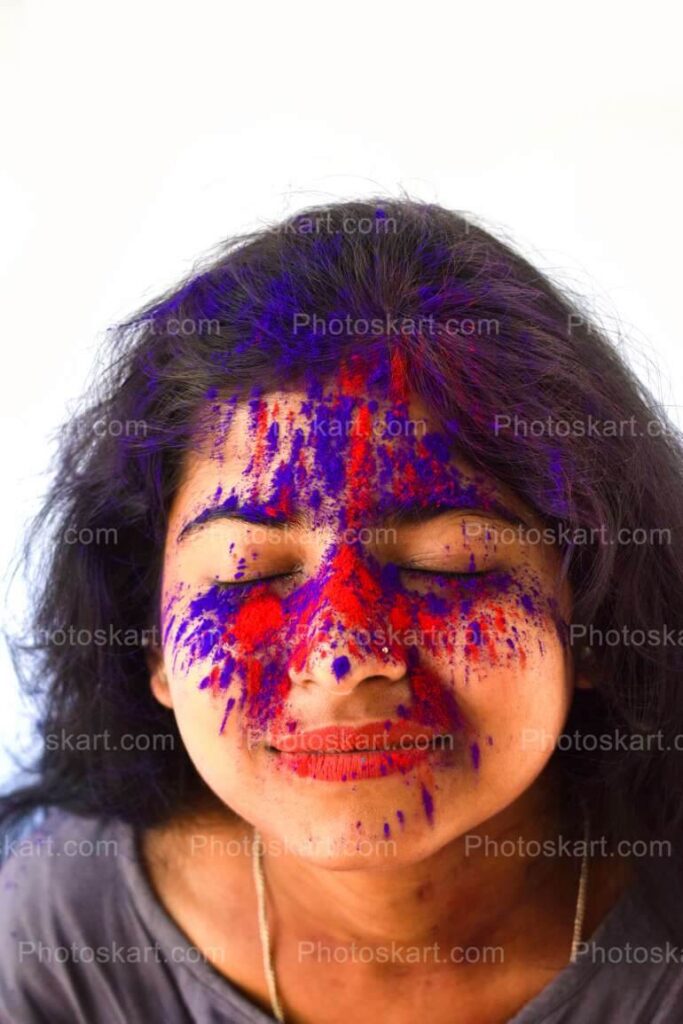 Portrait Of A Young Teenage Indian Girl Enjoying Holi Festival Stock Photo