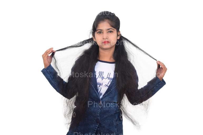 Pretty Indian Cute Girl Hand Touching Hair Stock Photography
