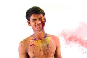 young-indian-handsome-boy-playing-holi-festival-stock-photo