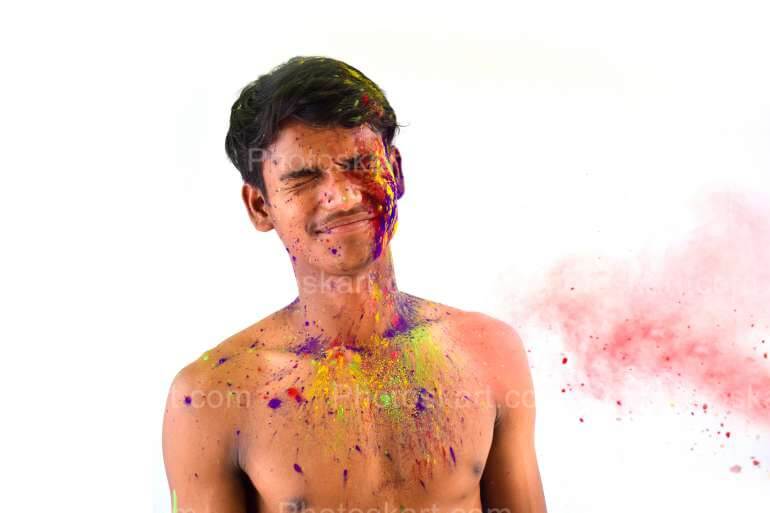 Young Indian Handsome Boy Playing Holi Festival Stock Photo
