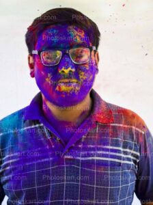 young-indian-man-celebrating-holi-festival-in-india-stock-photo