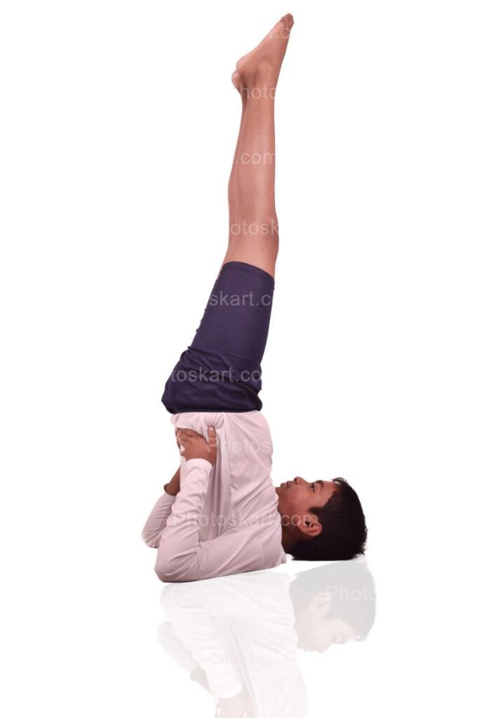 Teen Boy Doing Yoga Exercise On White Background