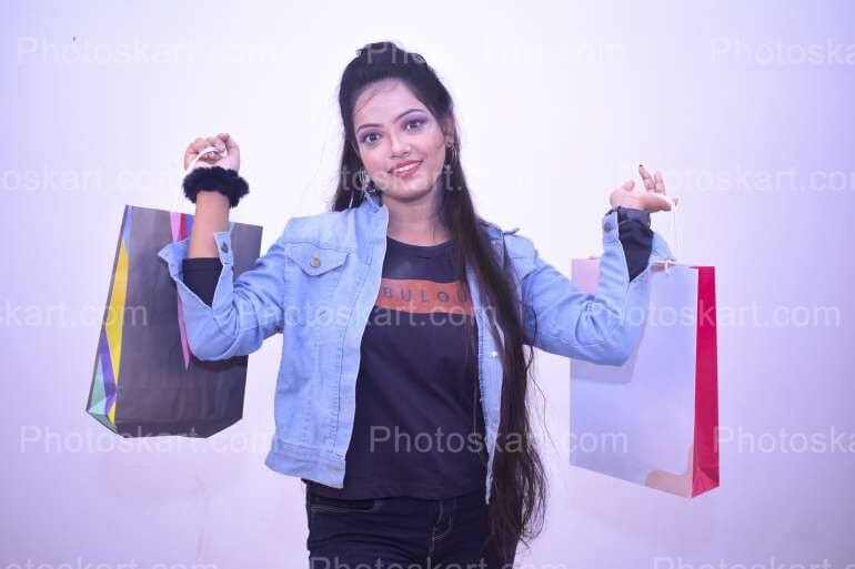 Smling Indian Girl With Shopping Bag