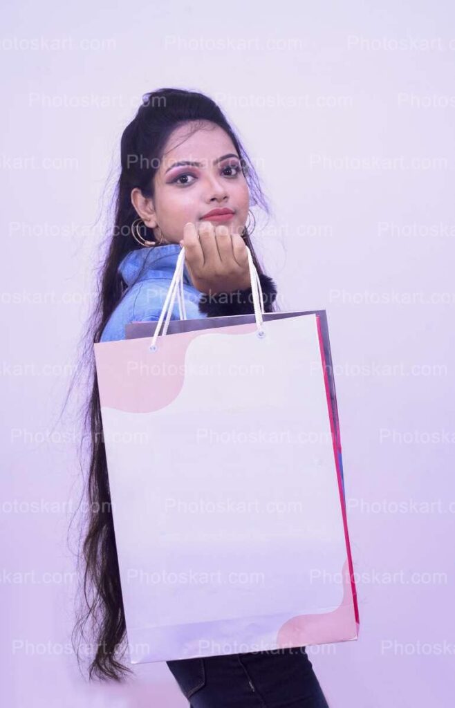 Stylish Indian Girl Posing With Shopping Bag
