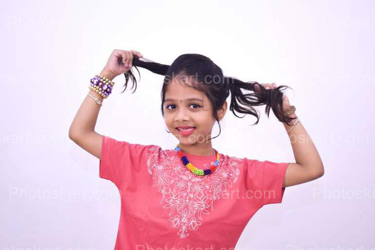 Indian Little Cute Girl With A Funny Face Pose