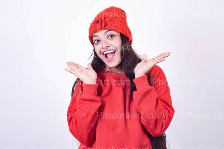 Smiling Indian Girl Wear Red Winter Cap