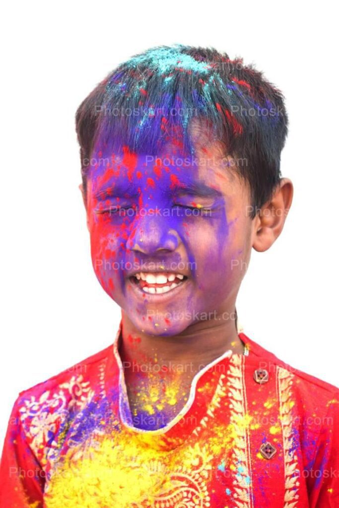 A Cute Indian Boy Enjoying In Holi