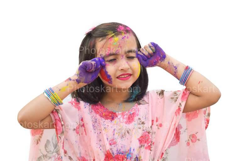 A Cute Indian Girl Posing With Hands In Holi