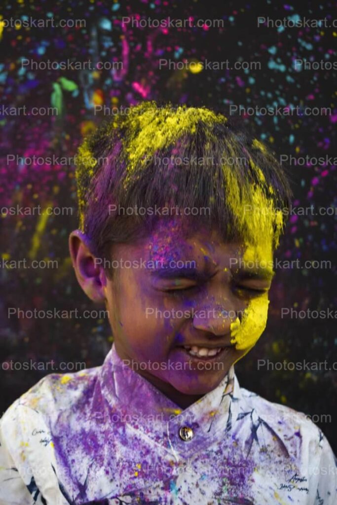 A Little Boy Enjoying Holi Festival