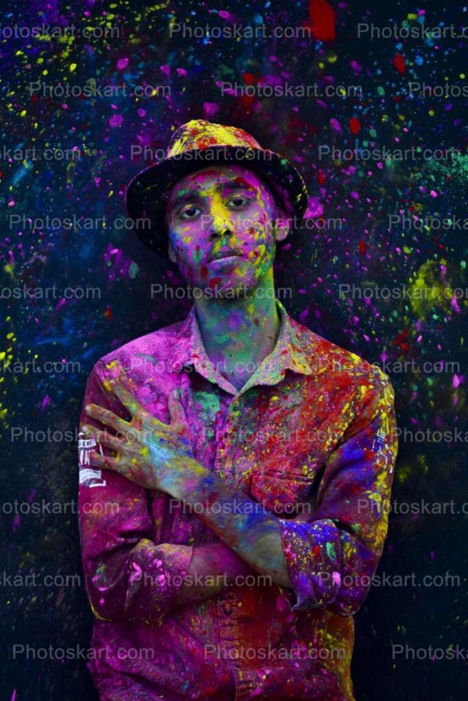 A Serious Boy Posing On Festival Of Colors