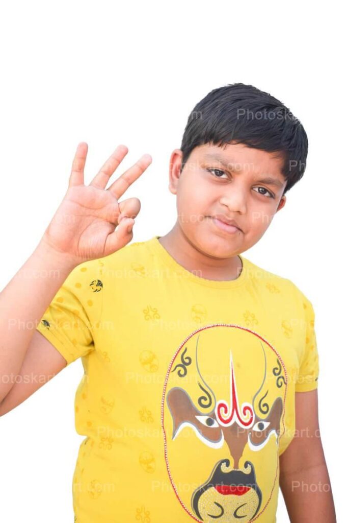 A Smart Boy Posing With Three Fingers