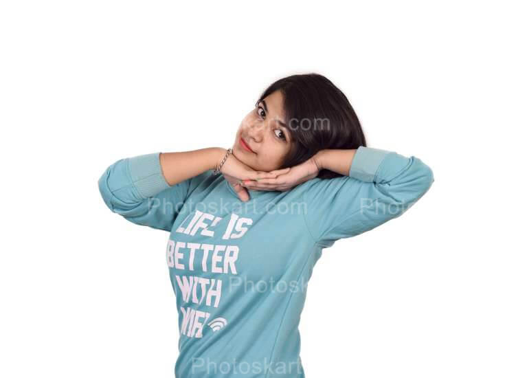 A Smart Indian Girl Lying On Hand Stock Photo