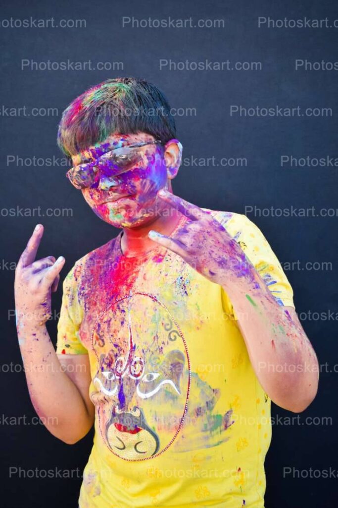 Cool Indian Boy Posing On Holi Festival