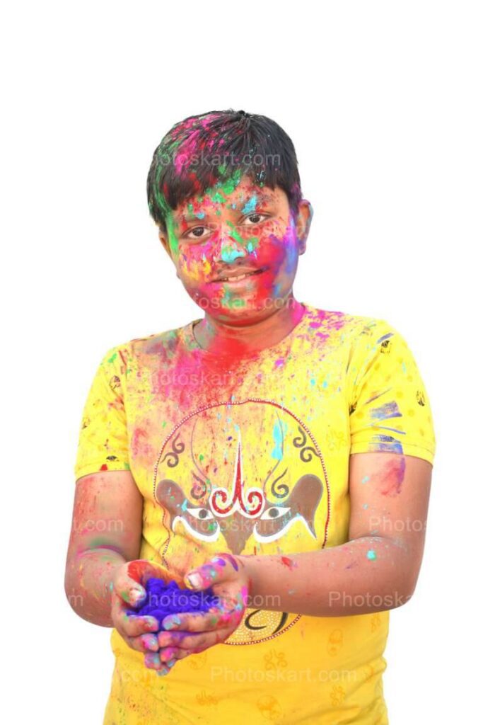 Cute Indian Boy Posing With Colors In Holi Festival