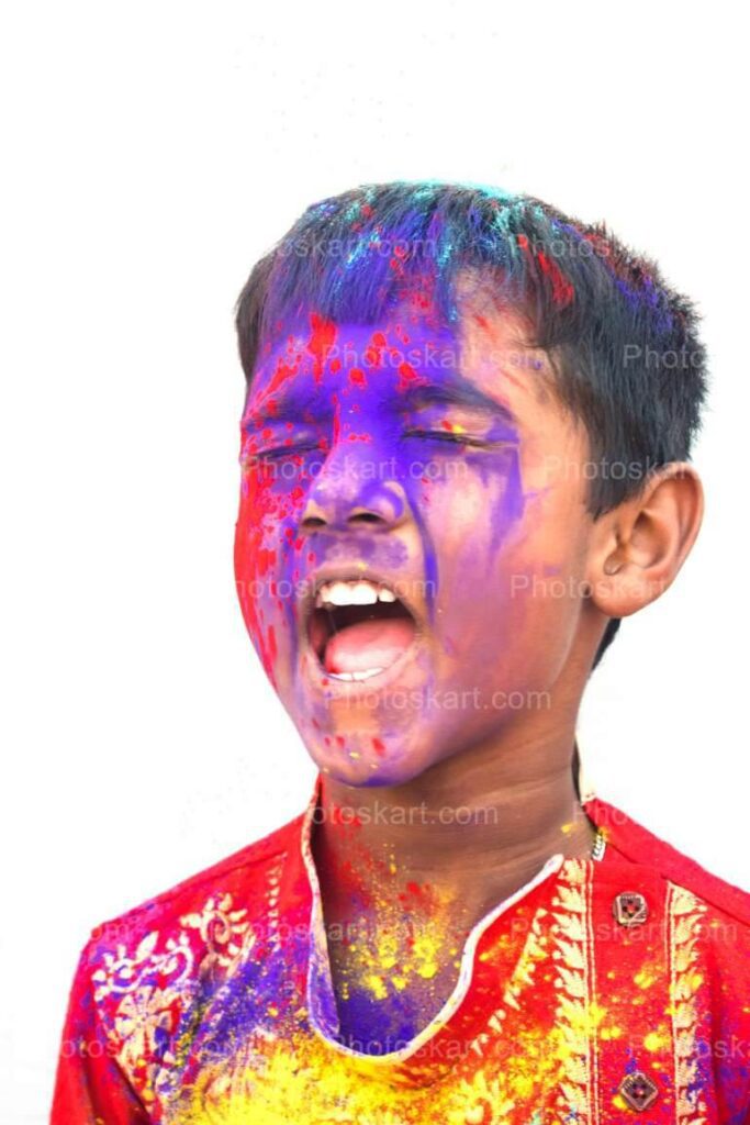 Cute Indian Boy Shouting In Holi Festival Stock Image