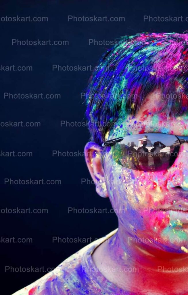 Cute Indian Boy With Colorful Face And Sunglass