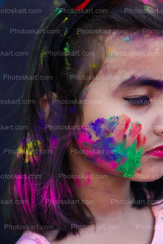 Cute Indian Girl Half Face Stock Image In Holi
