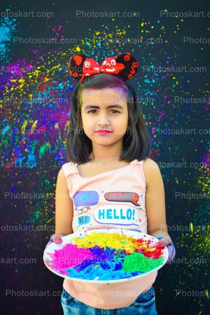 Cute Indian Girl Holding A Plate Of Colors Stock Image