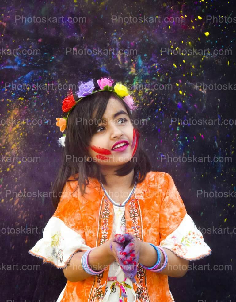 Cute Indian Little Girl Playing Holi