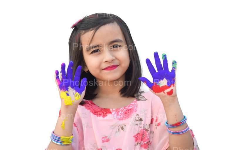Cute Smile Girl Posing Her Coloful Hands In Holi