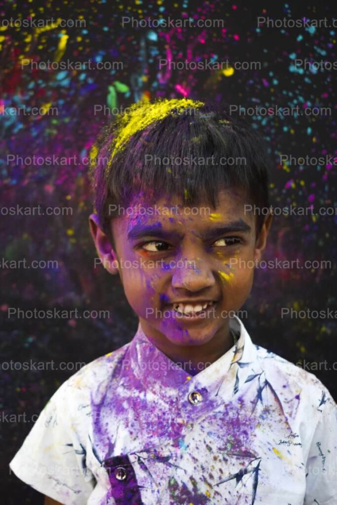 Happy Indian Baby Boy Playing Holi Stock Image