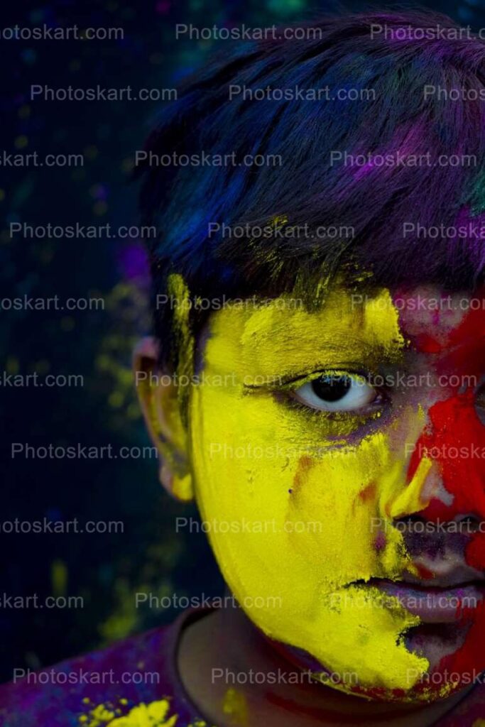Indian Boy Covered In Coloured Powder Pigment
