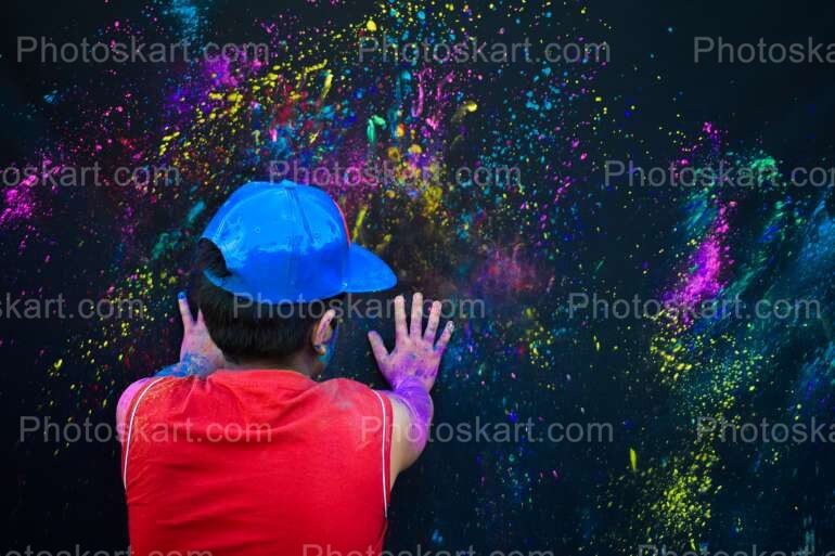 Indian Boy Doing Hand Stamp During Holi