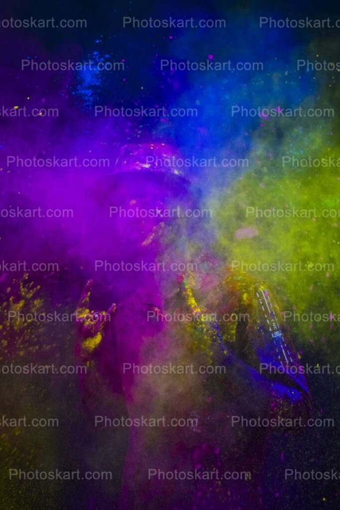 Indian Boy Getting Showered With Holi Colours