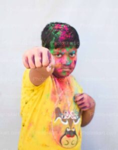 smart-indian-boy-punch-with-colorful-face
