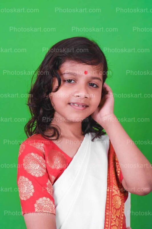 Beautiful Indian Girl In Traditional Attire Stock Image DG15523810922, beautiful indian girl in traditional attire stock image, stock photos, hindu stock photos, traditional stock photos, bengali woman stock photos, agomoni photoshoot, puja photoshoot, girl, indian girl, indian cute girl, ma, culture, south asian culture, bengal, clay, clay idol, celebration, puja, festival, indian girl images, bengali festival, celebration, asia, bengali, festival costume, devi, beauty, face, clothing, ceremony, bridal, jewellery, durga model, festival season, durga puja look. girl with sari, sari, tradition, bengali tradition, god, durga puja look photo shoot with white and red saree, bengali saree, female, glamor, ethnicity, women, model, culture model, durga puja model, durga puja model hd image, puja model pose, festival model photoshoot, festival model images, lady, indian girl photoshoot, green background photoshoot, gorgeous, hindu girl, hindu girl photoshoot, stock, royaly, new, child durga