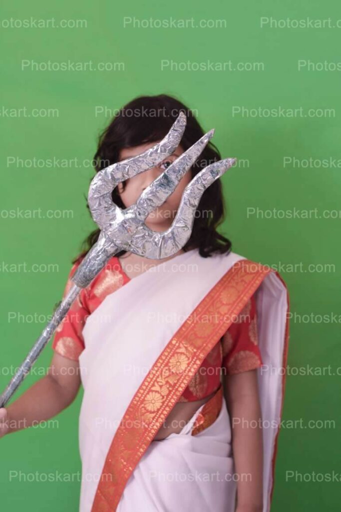 Cute Hindu Durga Girl Holding Trishul Royalty Photo