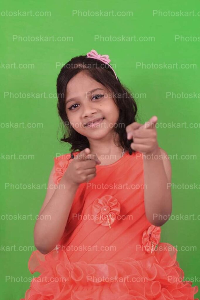 Cute Indian Girl Posing Fingers Pointing Stock Image