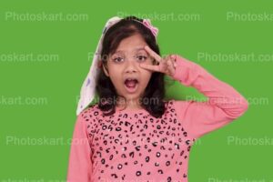 cute-indian-girl-posing-in-fornt-of-green-screen-stock-image