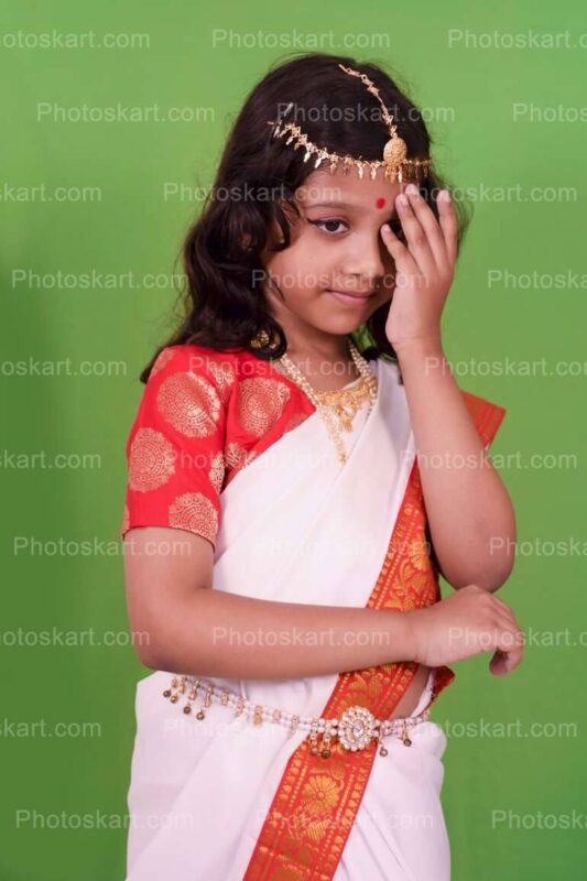 DG8023900922, cute indian girl traditional dance royalty image, stock photos, hindu stock photos, traditional stock photos, bengali woman stock photos, agomoni photoshoot, puja photoshoot, girl, indian girl, indian cute girl, ma, culture, south asian culture, bengal, clay, clay idol, celebration, puja, festival, indian girl images, bengali festival, celebration, asia, bengali, festival costume, devi, beauty, face, clothing, ceremony, bridal, jewellery, durga model, festival season, durga puja look. girl with sari, sari, tradition, bengali tradition, god, durga puja look photo shoot with white and red saree, bengali saree, female, glamor, ethnicity, women, model, culture model, durga puja model, durga puja model hd image, puja model pose, festival model photoshoot, festival model images, lady, indian girl photoshoot, green background photoshoot, gorgeous, hindu girl, hindu girl photoshoot, stock, royaly, new, dance model, cute girl dance pose, girl indian dance, child durga