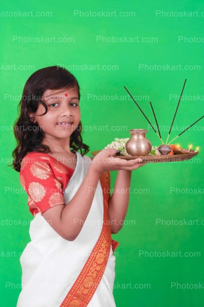 Hindu Girl Holding Thali Side Pose Royalty Image