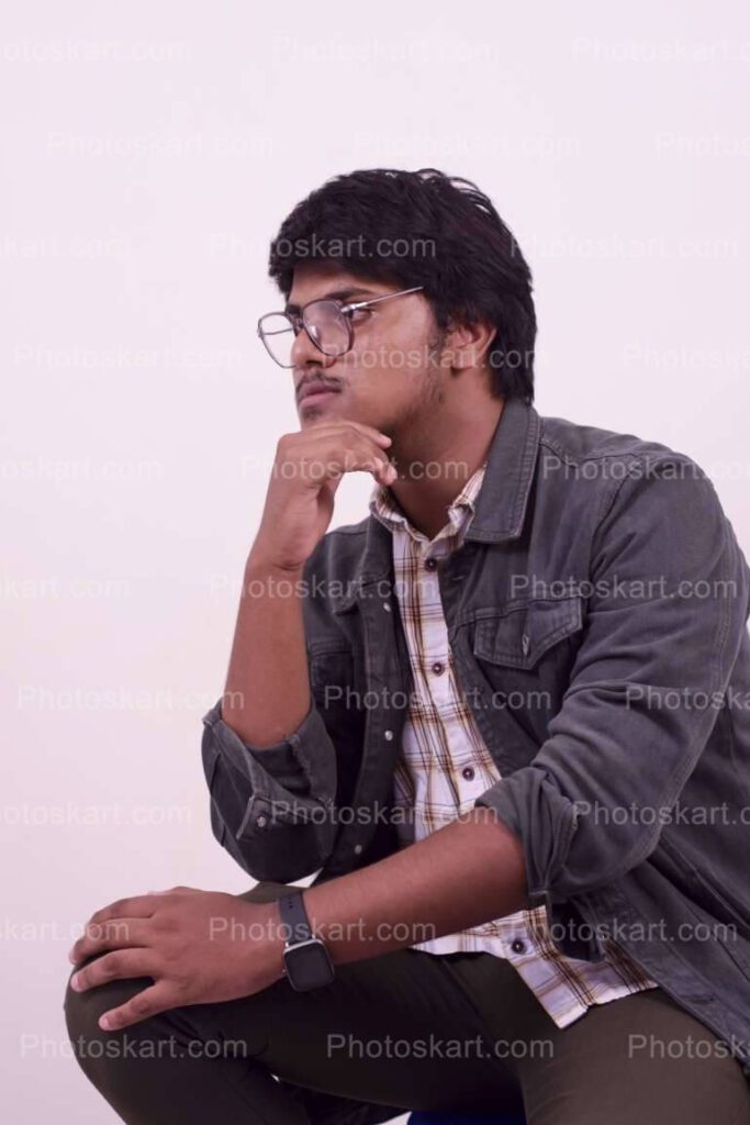 Indian Boy Posing Thinking Something Royalty Free Image