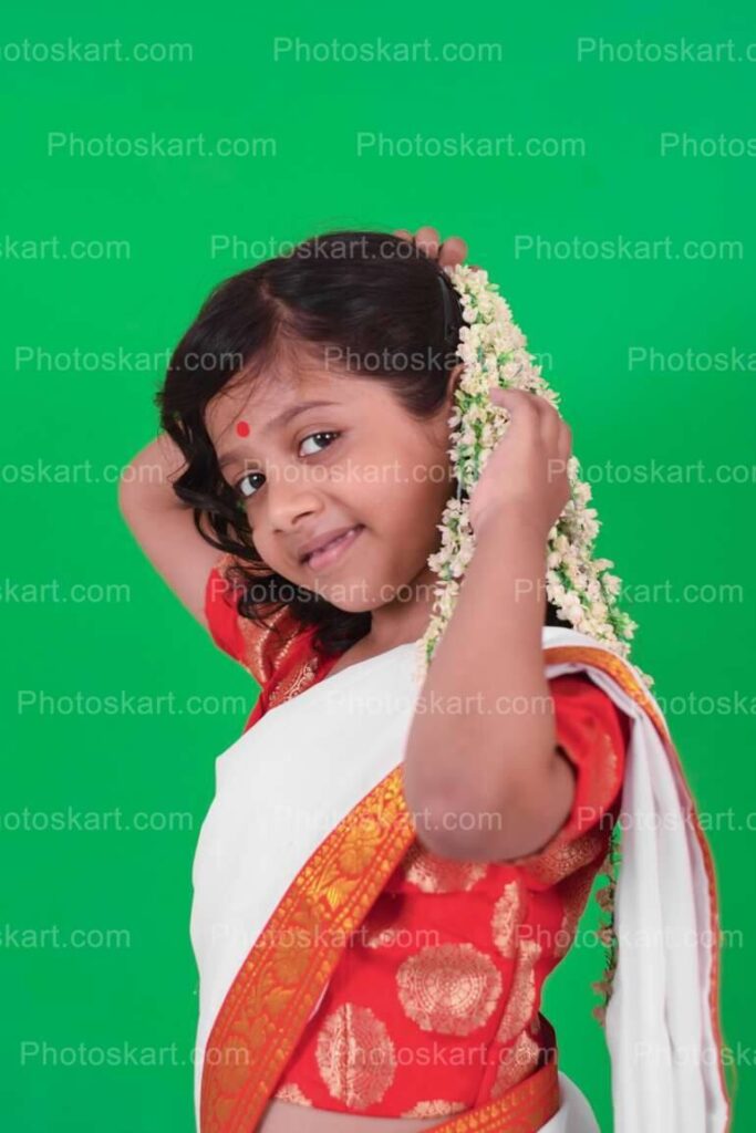 Indian Girl Smiling With Flower On The Heas Royalty Image