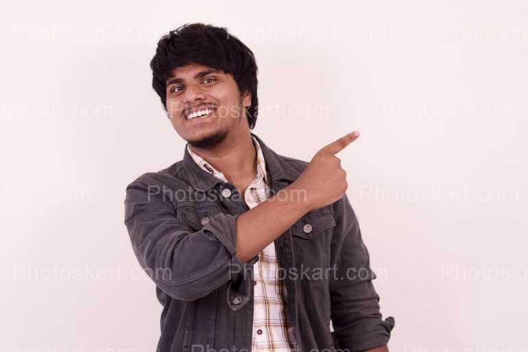 Indian Smart Boy Pointing Something Royaltyfree Stock Image