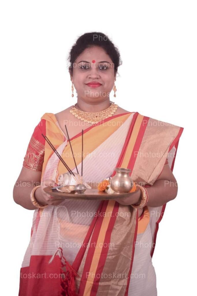 Indian Woman Posing With Puja Thali Stock Image
