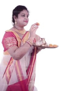 indian-woman-throwing-flower-with-puja-thali-stock-image