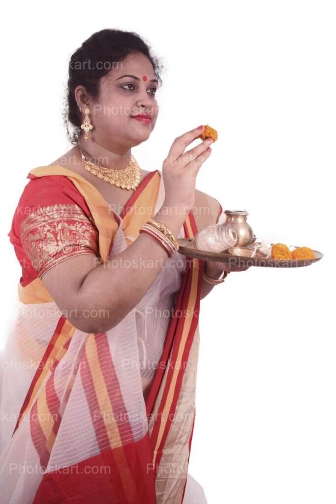 Model Holding Indian Puja Thali And Flower Stock Image